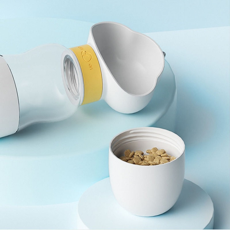 Dog travel water bottle with integrated food container for pets on the go2